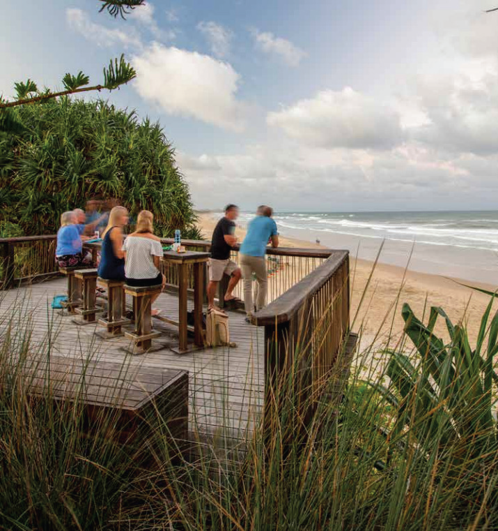 Image of timber viewing deck looking over the ocean.