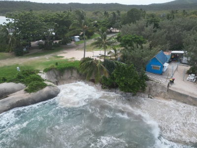 A photo showing the erosion of the beach after Cyclone Alfred, near the Hideaway.