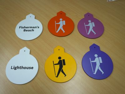 A photo showing the small trail markers